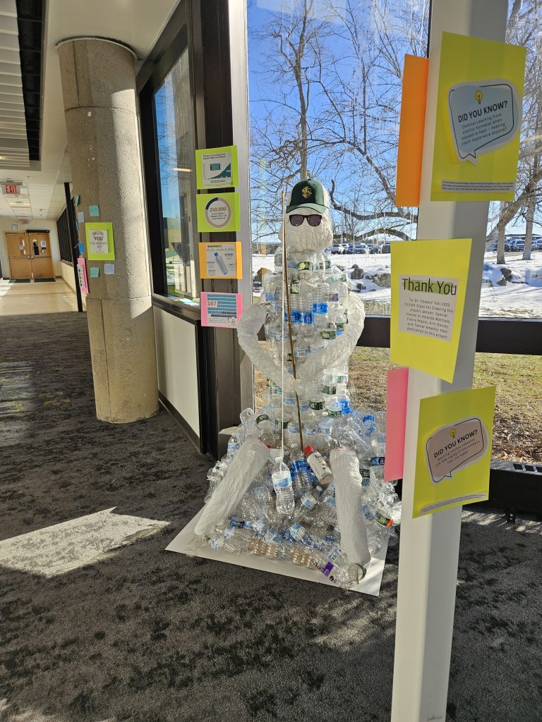 Photo of "person" made from plastic bottles