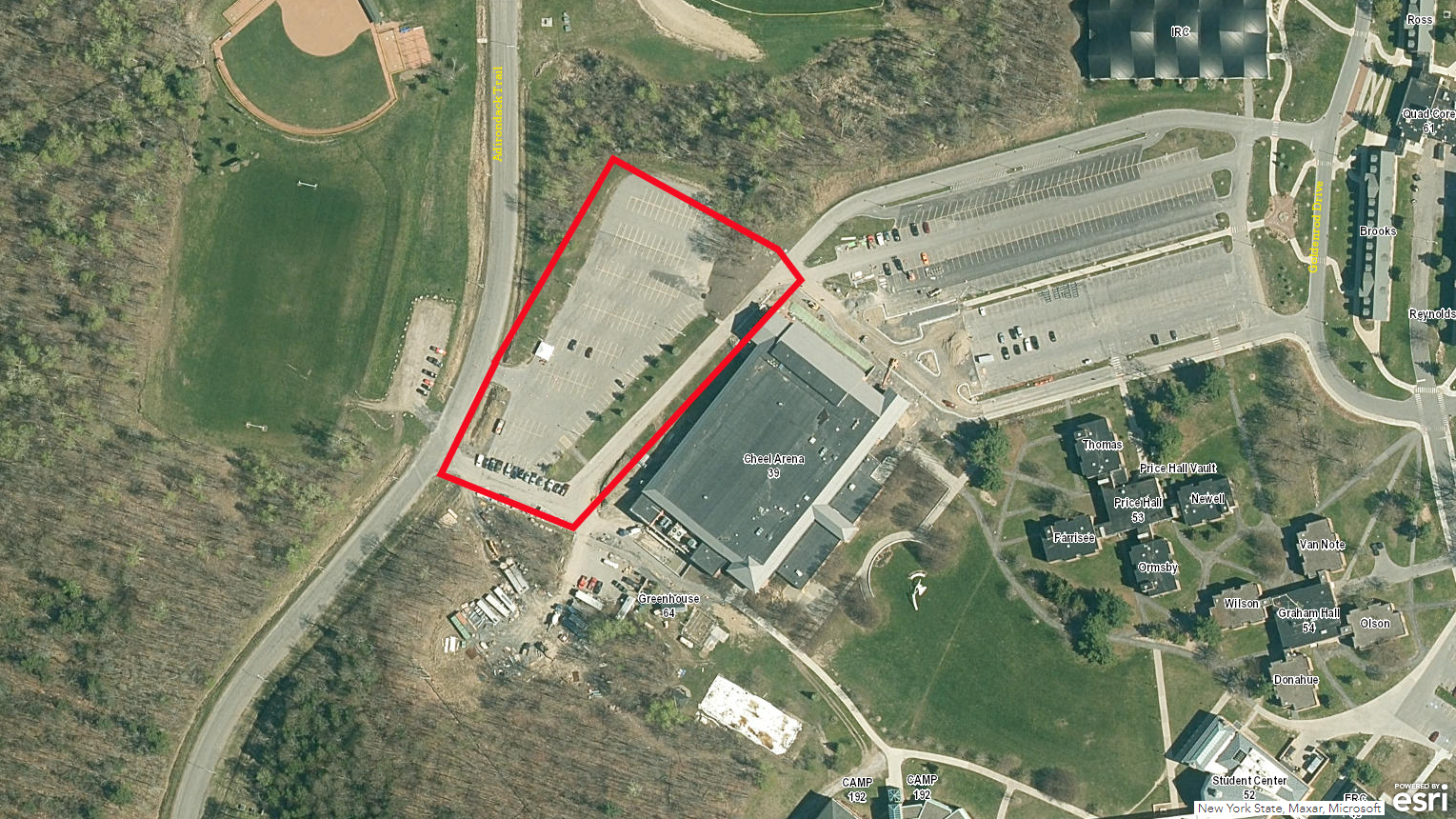 An aerial view of the Clarkson University Campus, with a red line indicated the back lot of Cheel parking lot