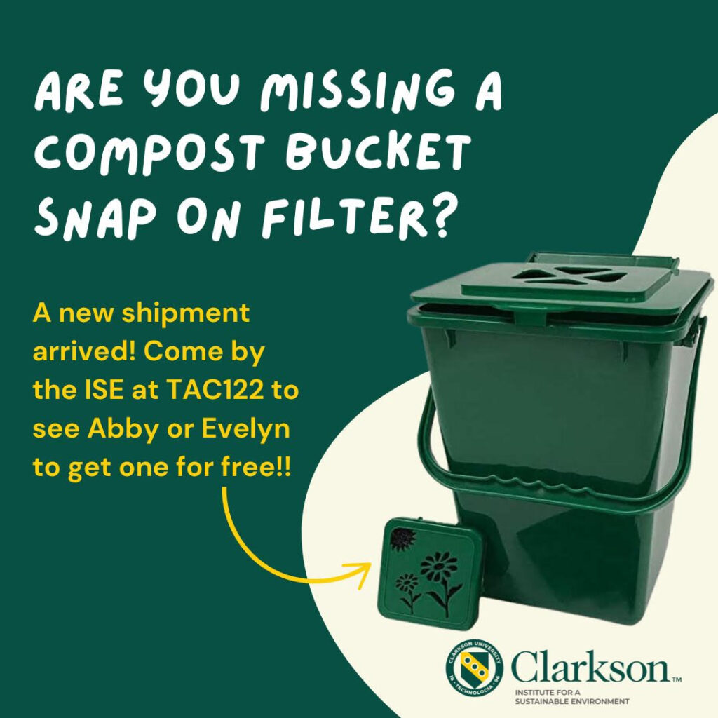 A green compost bucket with snap-on filter lid is pictured above the Clarkson Institute for a Sustainable Environment logo. Text reads: "Are you missing a compost bucket snap on filter? A new shipment arrived! Come by the ISE at TAC122 to see Abby or Evelyn to get one for free!!