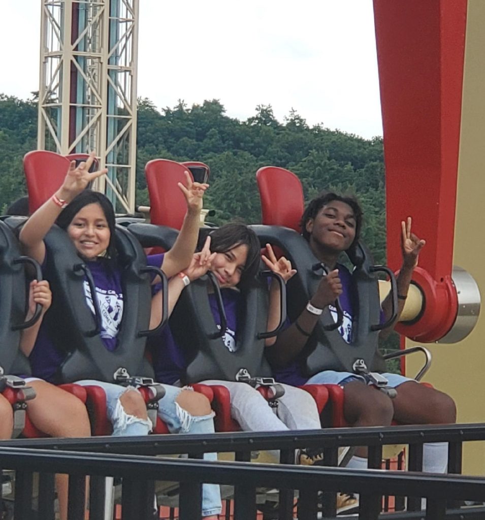 Peekskill Middle School students enjoy a trip to Six Flags Great Escape during IMPETUS 2023, which focused on amusement park design and performance metrics. 